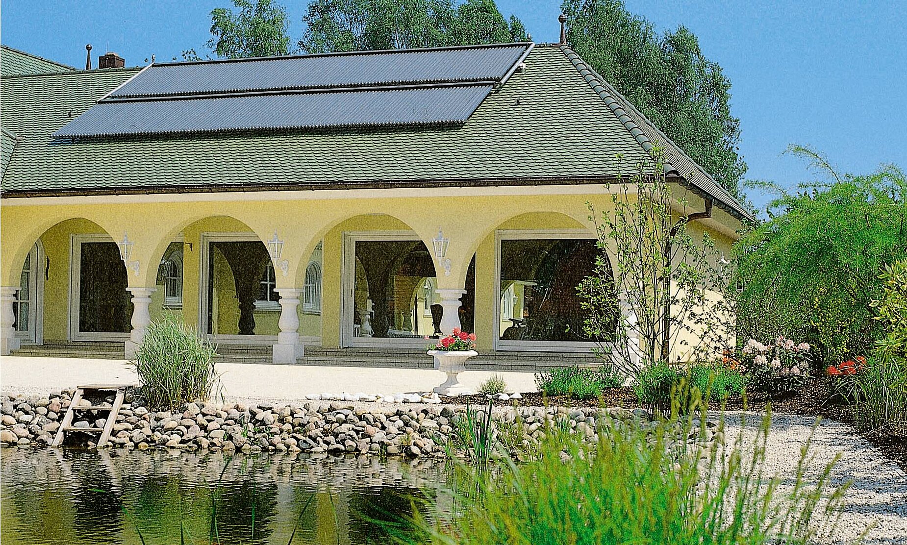 Luxury timber frame house with round arches