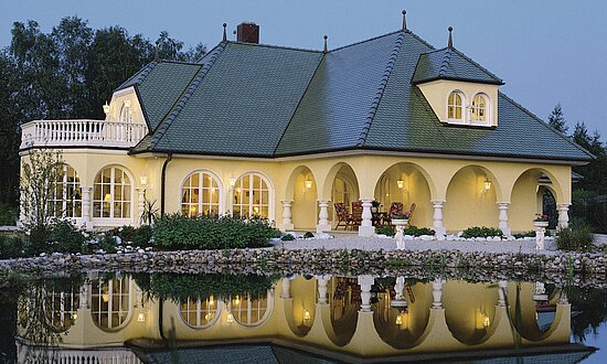 Luxury timber frame house with round arches