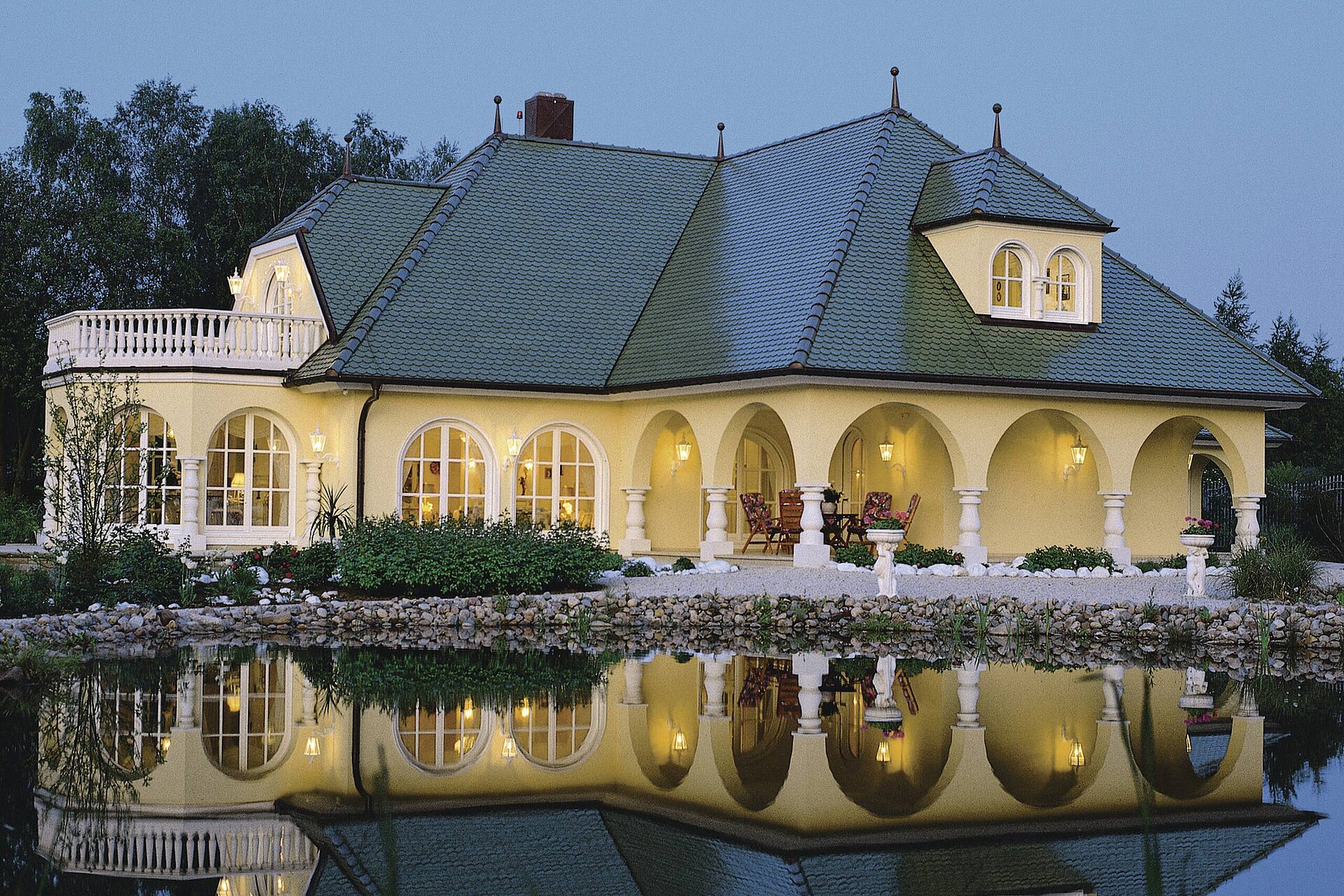 Luxury timber frame house with round arches