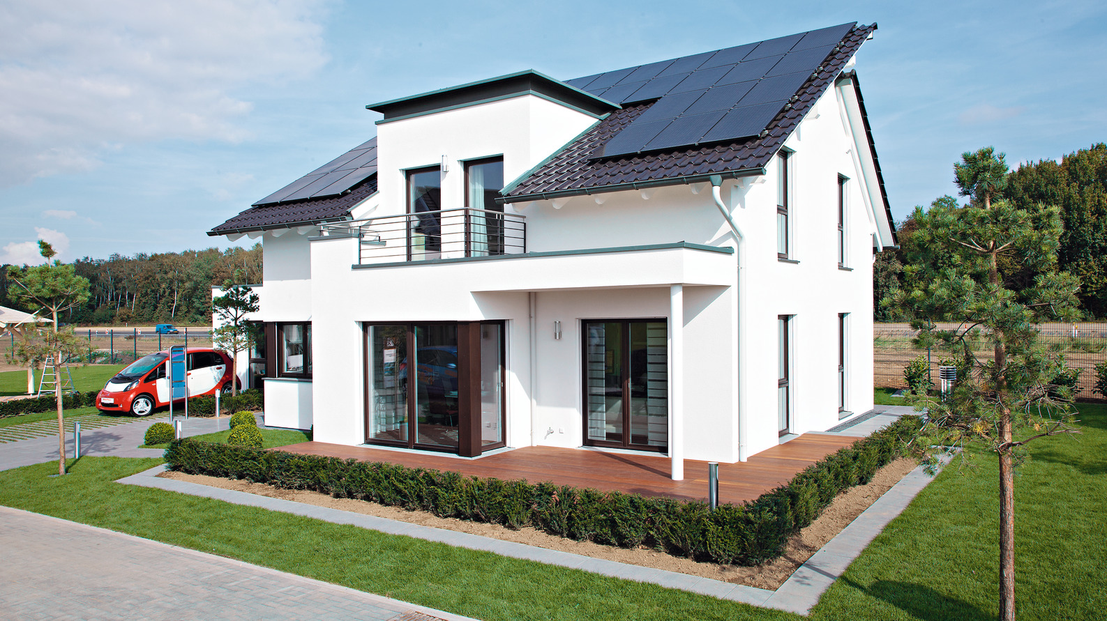 Einfamilienhaus mit versetztem Pultdach Einfamilienhaus mit versetztem Pultdach