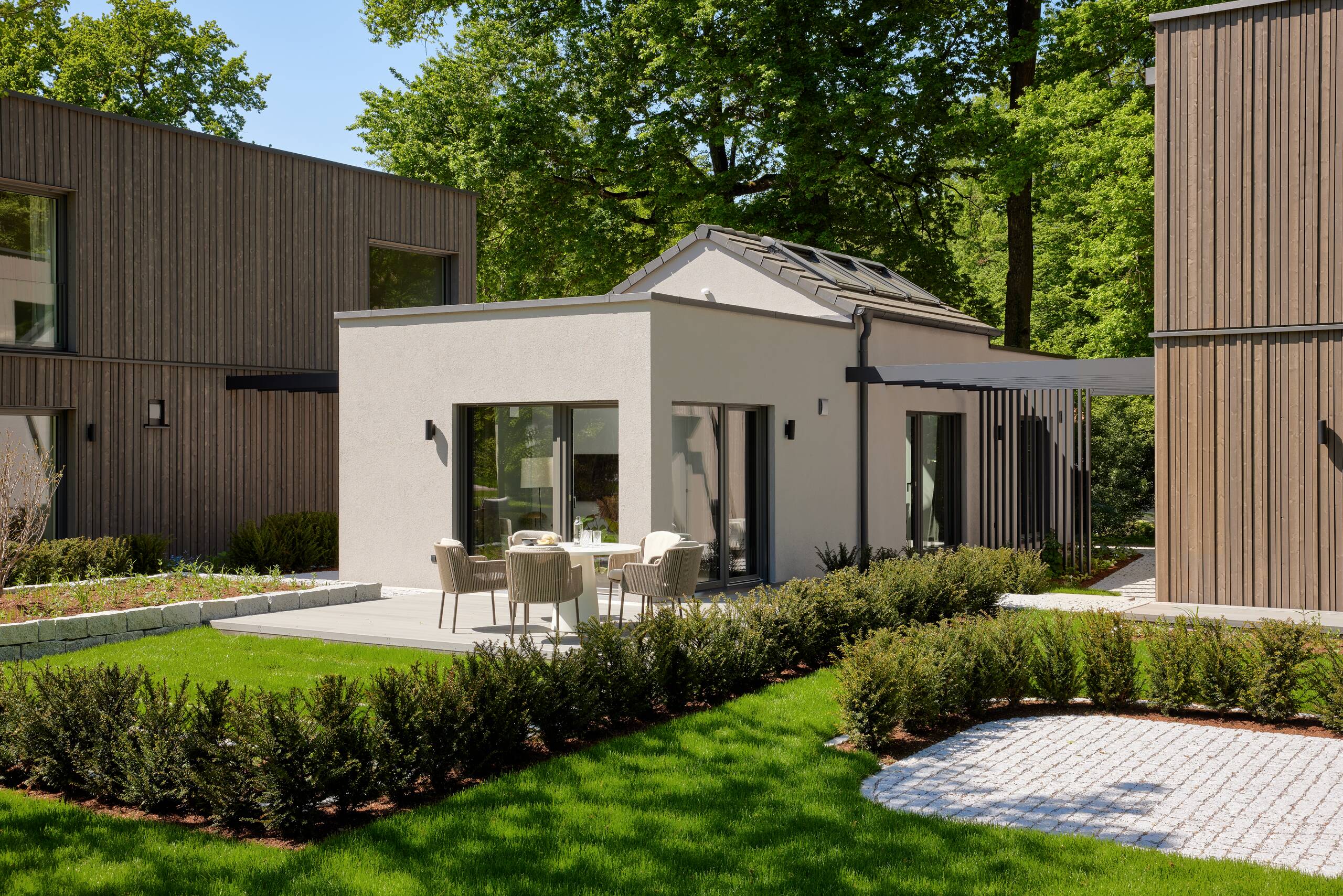 Ausstellungshaus OPTION - Bungalow mit partiellem Satteldach Musterhaus OPTION