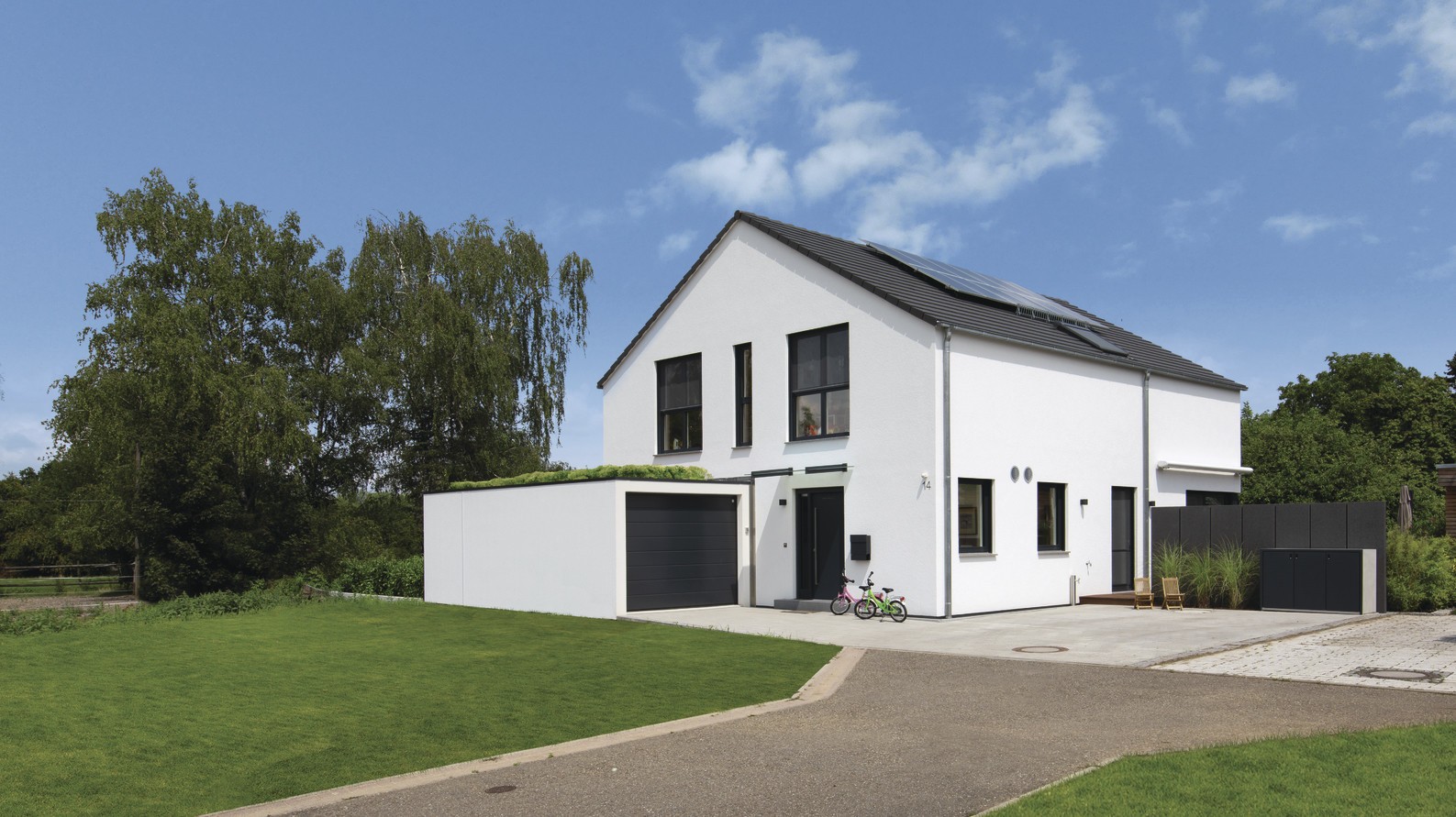 Einfamilienhaus mit Garage und Satteldach Einfamilienhaus mit Garage