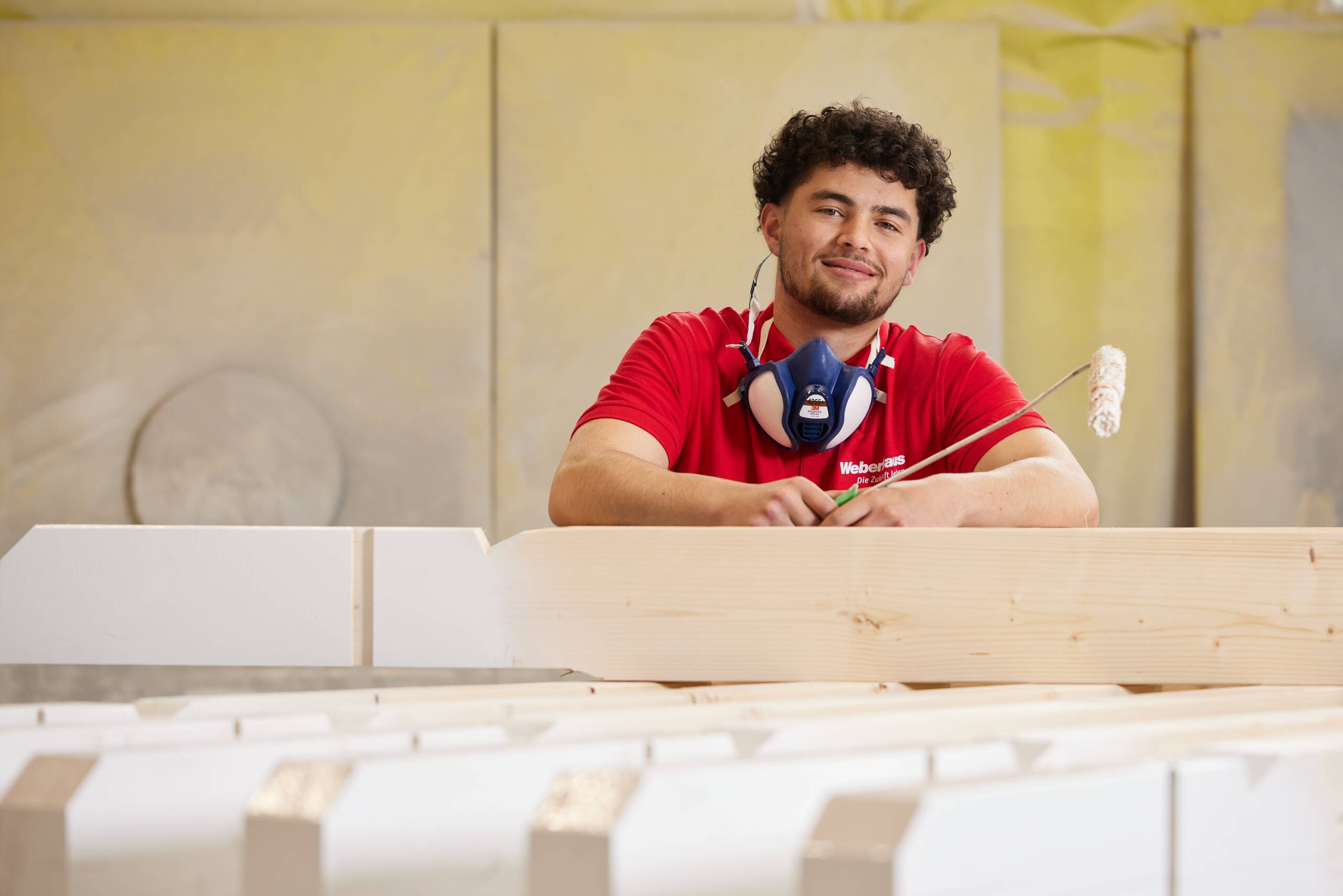 Auszubildender zur Maler-Ausbildung bei WeberHaus